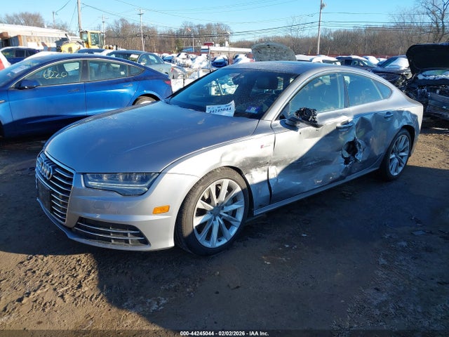 2016 AUDI A7 WAUWGAFC4GN092575 Photo 1
