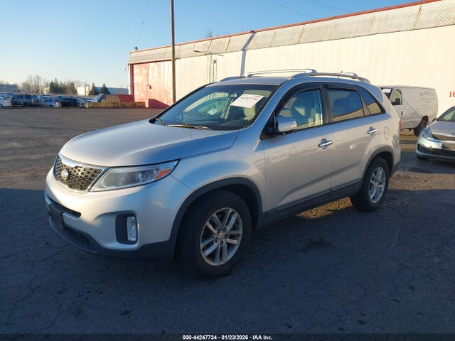 5XYKT3A62EG440002 KIA SORENTO LX