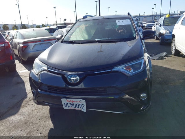 JTMRJREVXJD181115 Toyota Rav4 Hybrid Xle