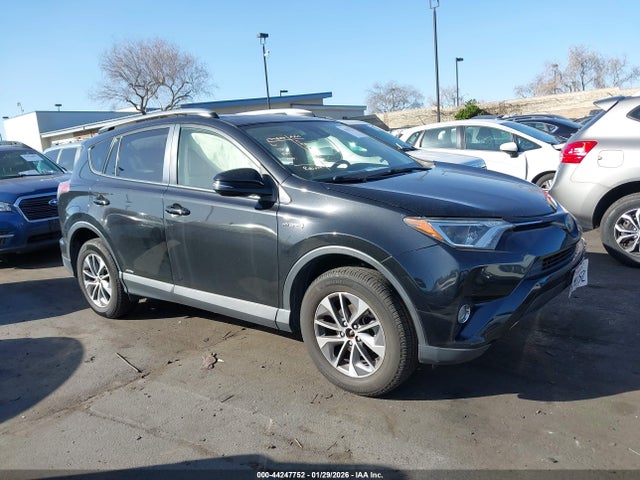JTMRJREVXJD181115 Toyota Rav4 Hybrid Xle