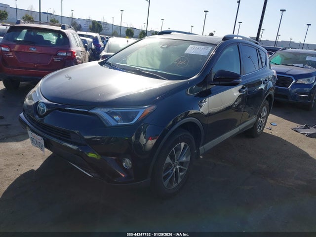 JTMRJREVXJD181115 Toyota Rav4 Hybrid Xle