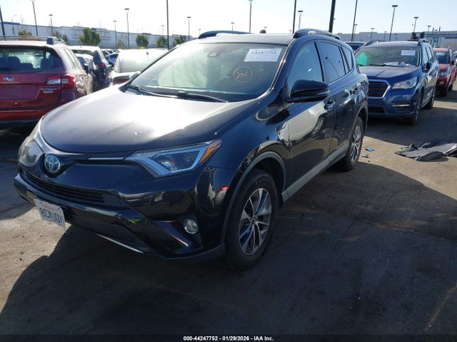 JTMRJREVXJD181115 Toyota Rav4 Hybrid Xle