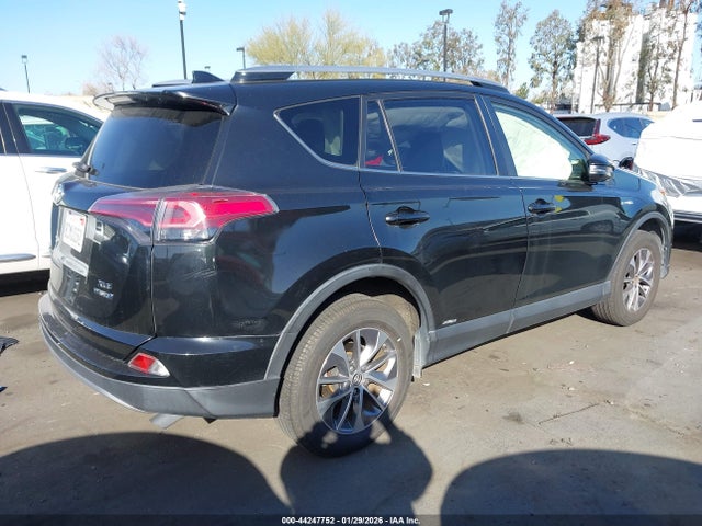 JTMRJREVXJD181115 Toyota Rav4 Hybrid Xle