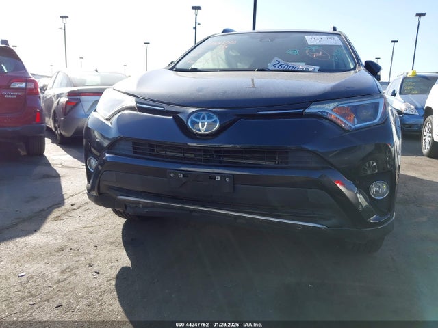JTMRJREVXJD181115 Toyota Rav4 Hybrid Xle