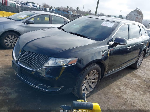 2LMHJ5NK6EBL56272 Lincoln Mkt Livery