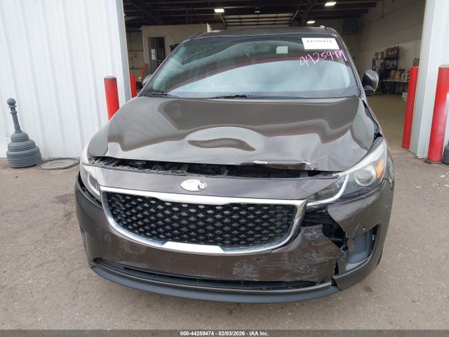 KNDMB5C11H6331613 KIA SEDONA LX