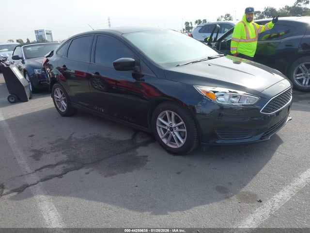 Ford FOCUS SE 2018 1FADP3FE7JL312856 головне зображення