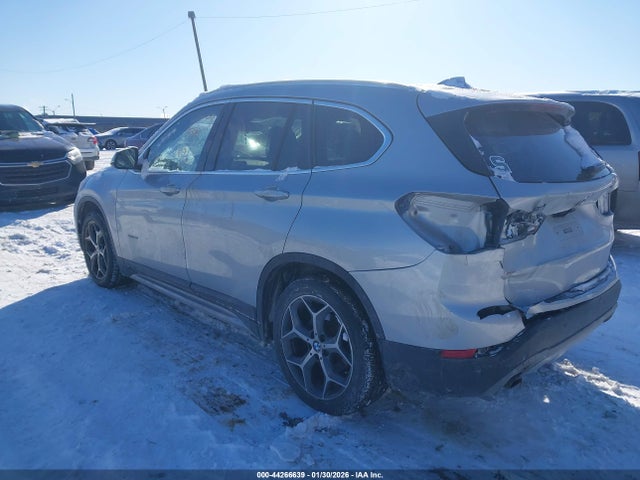 2016 BMW X1 WBXHT3C32GP889583 Photo 2