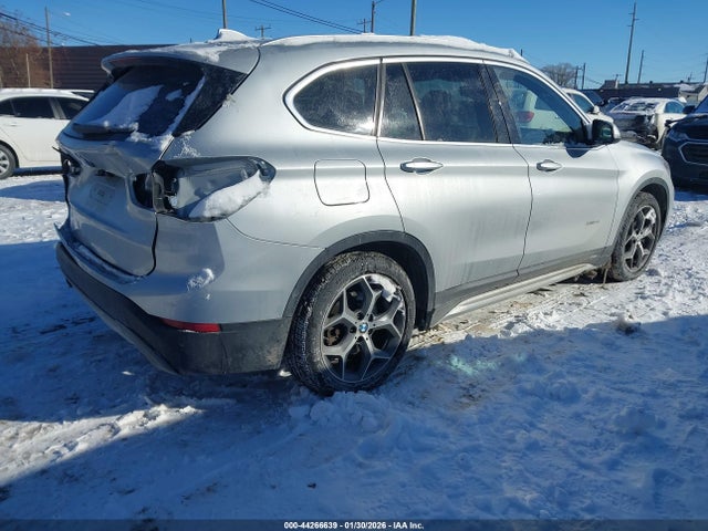 2016 BMW X1 WBXHT3C32GP889583 Photo 3