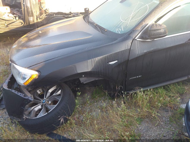 2015 BMW X4 5UXXW5C54F0E88929 Photo 1