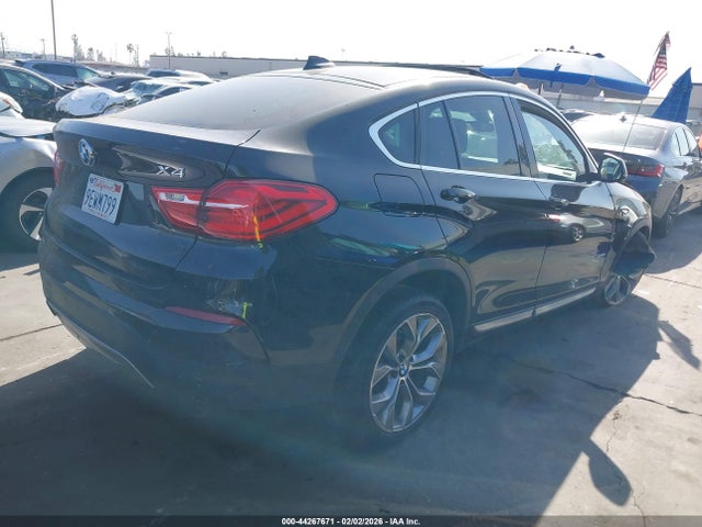 2015 BMW X4 5UXXW5C54F0E88929 Photo 3
