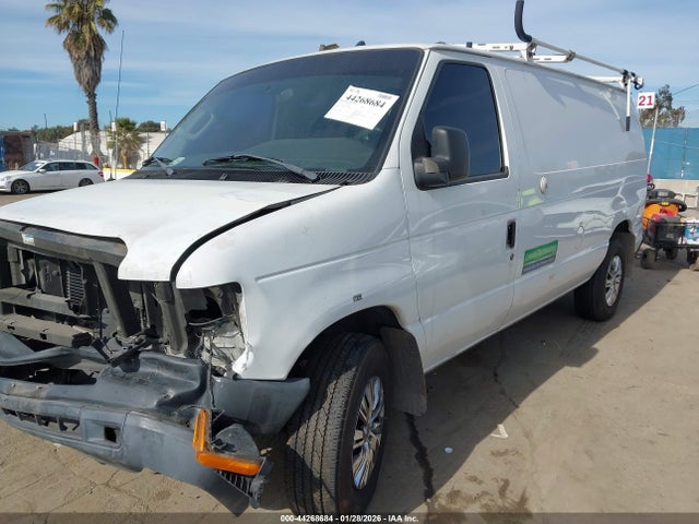 2010 FORD E-250 1FTNE2EL1ADA47618 Photo 1