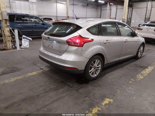 1FADP3K2XGL319823 Ford FOCUS SE