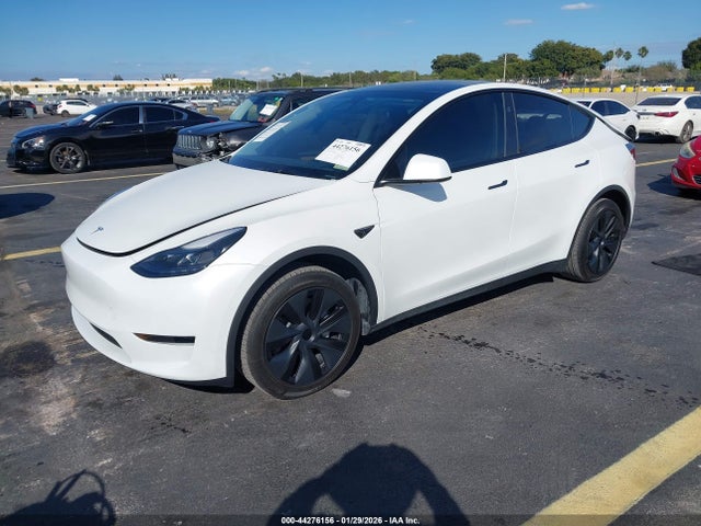 2024 TESLA MODEL Y 7SAYGDED2RF206990 Photo 1