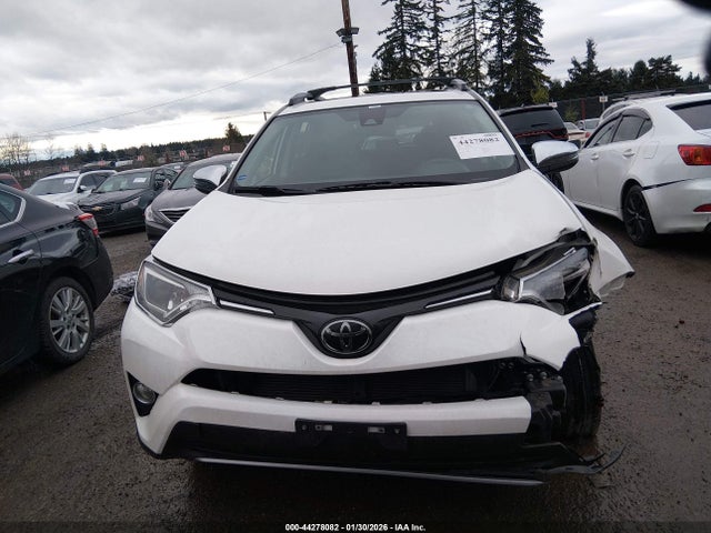 JTMRFREVXJJ724028 Toyota Rav4 Xle