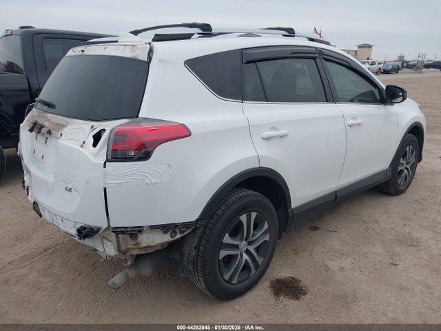 2T3ZFREV3GW290996 Toyota RAV4 LE