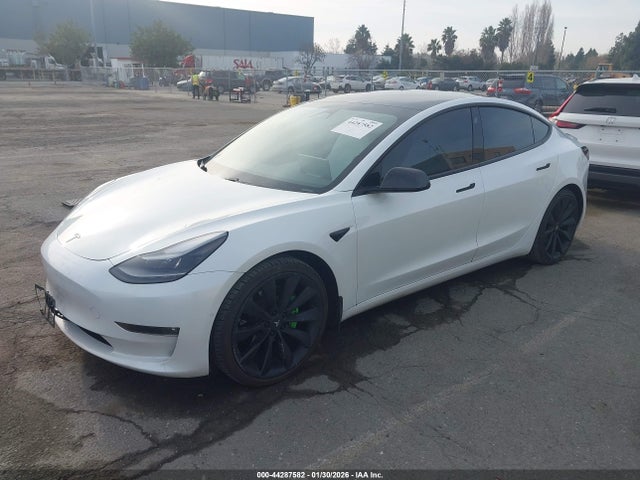 2021 TESLA MODEL 3 5YJ3E1EB6MF869028 Photo 1