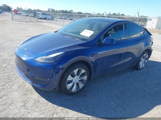 2023 TESLA MODEL Y 7SAYGDEE0PF709505 Photo 1