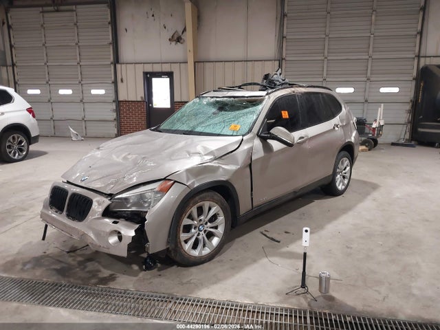 2014 BMW X1 WBAVL1C57EVY20528 Photo 1