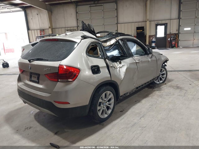 2014 BMW X1 WBAVL1C57EVY20528 Photo 3