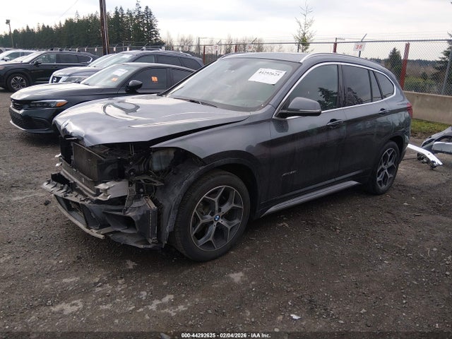 2016 BMW X1 WBXHT3C36G5E56587 Photo 1