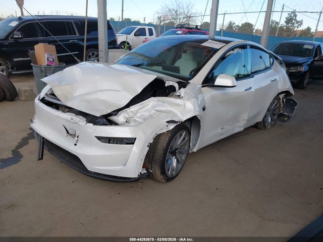 2026 TESLA MODEL Y 7SAYGDEE7TF516004 Photo 1