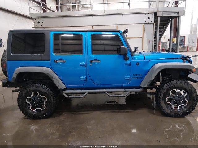 1C4HJWDG8EL200141 Jeep Wrangler Unlimited Sport