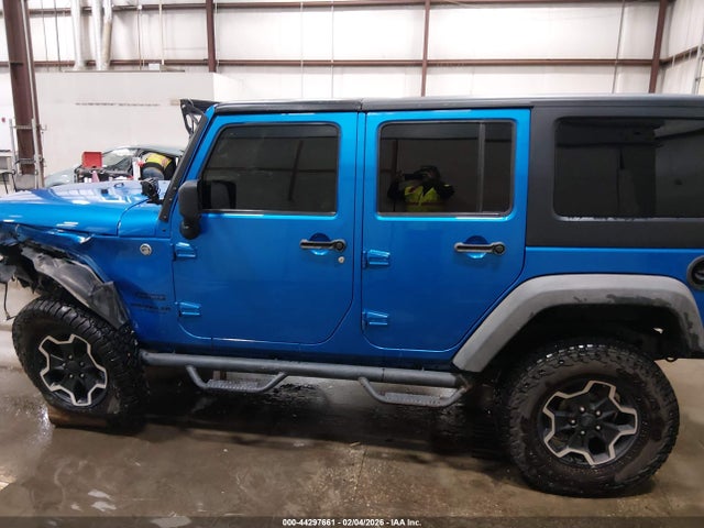 1C4HJWDG8EL200141 Jeep Wrangler Unlimited Sport
