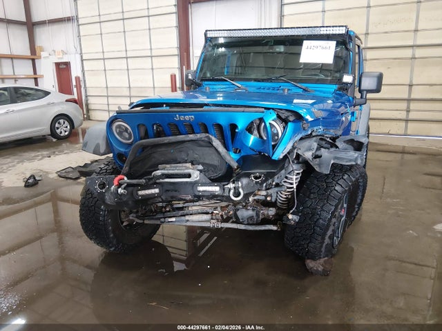 1C4HJWDG8EL200141 Jeep Wrangler Unlimited Sport