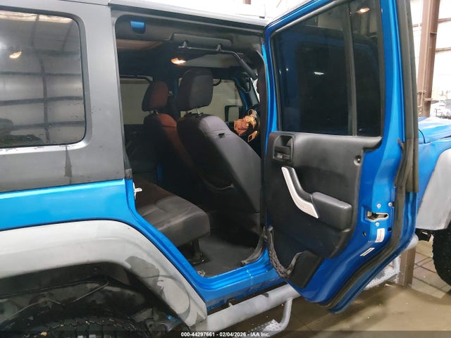 1C4HJWDG8EL200141 Jeep Wrangler Unlimited Sport
