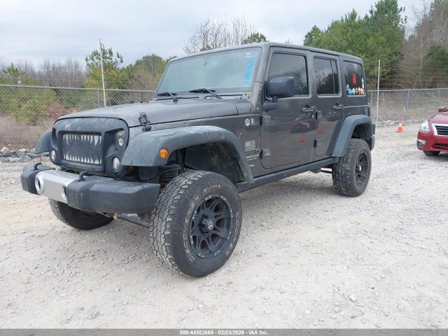1C4BJWDG9GL327392 Jeep Wrangler Unlimited Sport