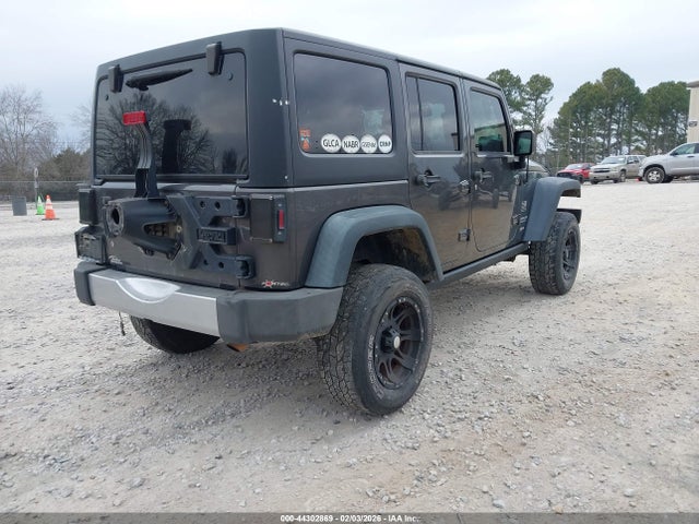1C4BJWDG9GL327392 Jeep Wrangler Unlimited Sport