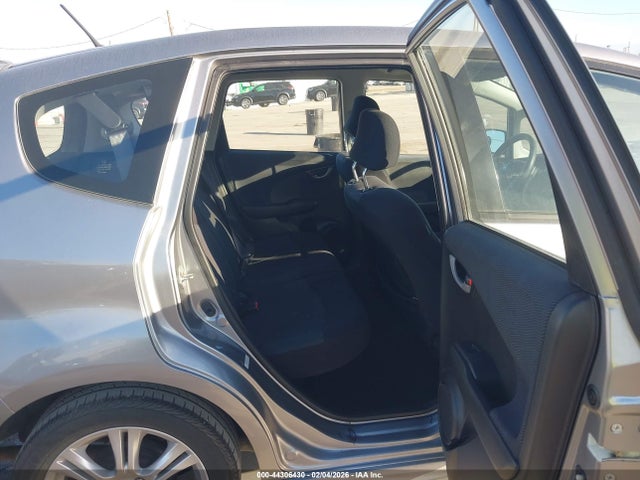 2009 HONDA FIT JHMGE88499S045556 Photo 7
