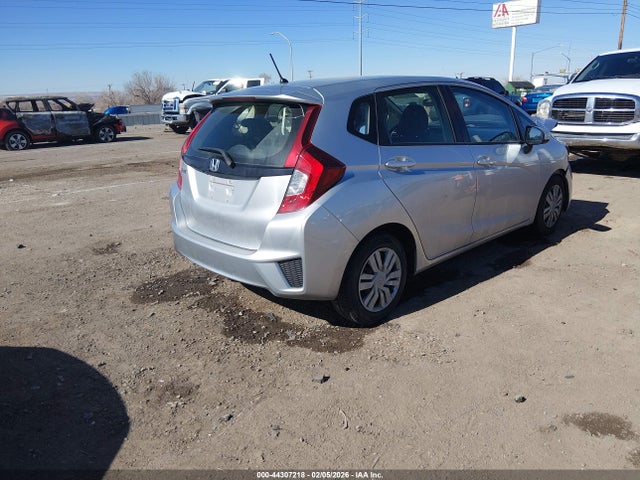 JHMGK5H58GX014413 Honda FIT LX