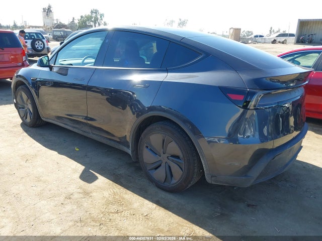2026 TESLA MODEL Y 7SAYGDED1TF427181 Photo 2