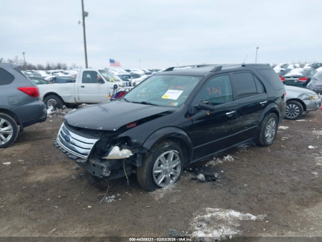 2008 FORD TAURUS X 1FMDK06WX8GA34176 Photo 1