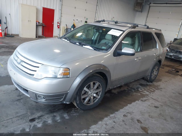 2008 FORD TAURUS X 1FMDK05W18GA20703 Photo 1