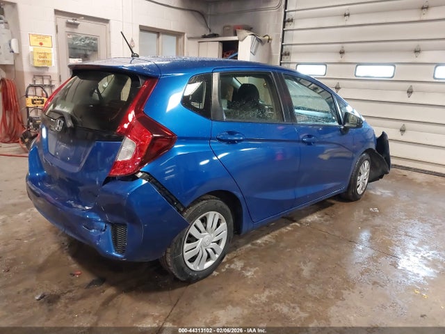 JHMGK5H54GX007426 Honda FIT LX