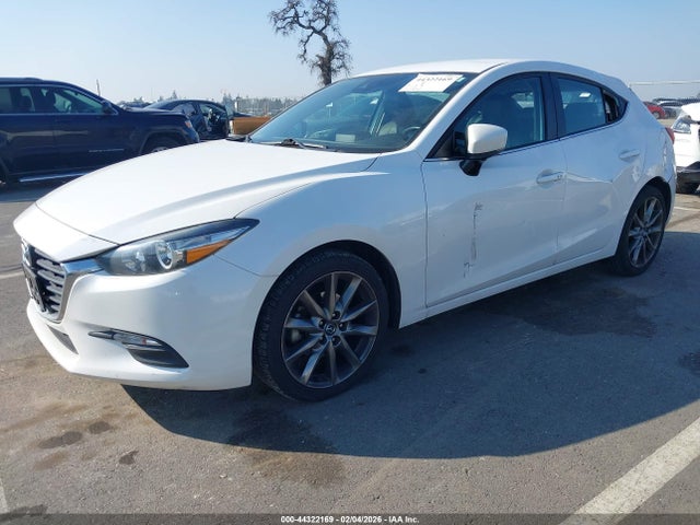 3MZBN1L30JM239694 Mazda Mazda3 Touring