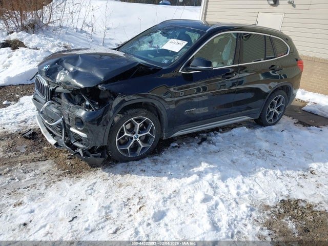 2016 BMW X1 WBXHT3C35G5E51476 Photo 1