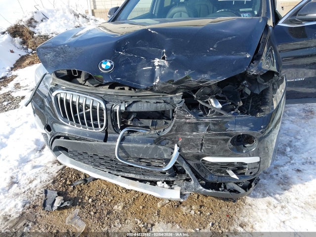 2016 BMW X1 WBXHT3C35G5E51476 Photo 5