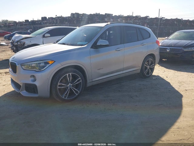 2016 BMW X1 WBXHT3C38G5E51570 Photo 1