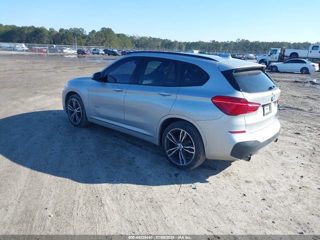 2016 BMW X1 WBXHT3C38G5E51570 Photo 2