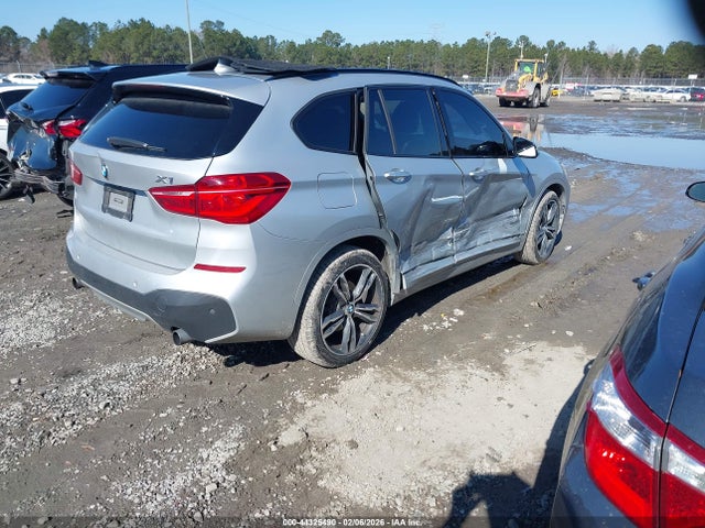 2016 BMW X1 WBXHT3C38G5E51570 Photo 3
