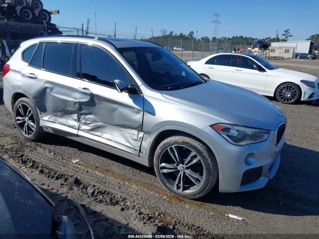 2016 BMW X1 WBXHT3C38G5E51570 Photo 5