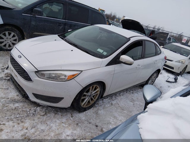 2015 FORD FOCUS 1FADP3F24FL355466 Photo 1