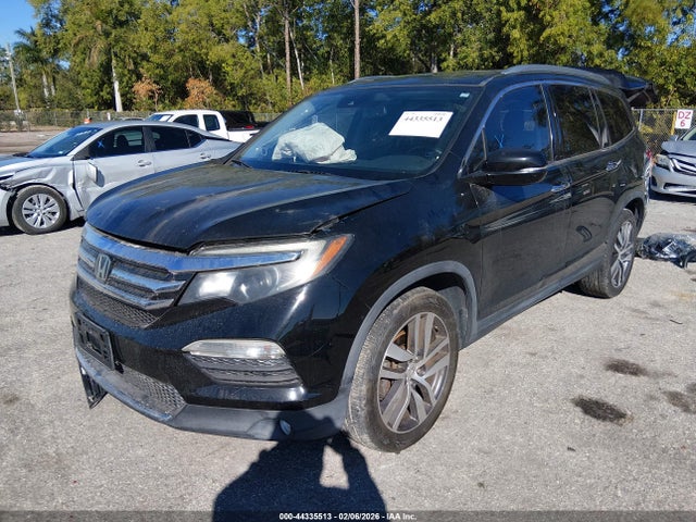 Продажа на аукционе авто 2016 Honda Pilot Touring, vin: 5FNYF5H96GB014207, номер лота: 44335513