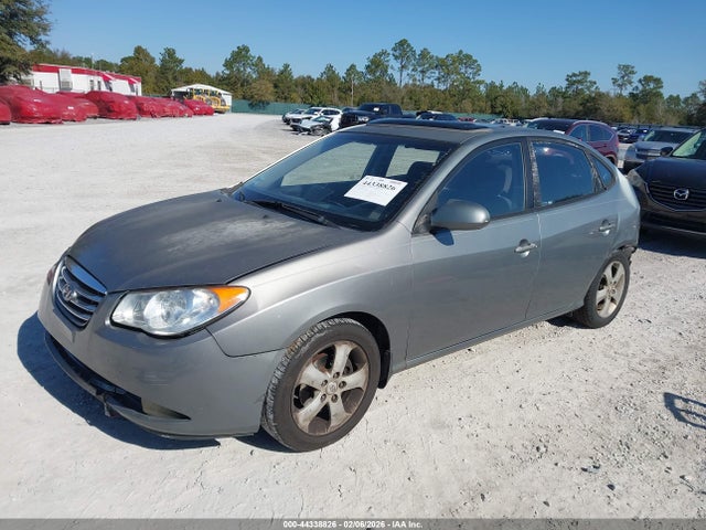 2010 HYUNDAI ELANTRA KMHDU4AD4AU011720 Photo 1
