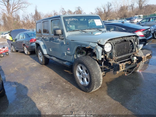 44338904 :رقم المزاد ، 1C4BJWEG0EL104797 vin ، 2014 Jeep Wrangler Unlimited Sahara مزاد بيع