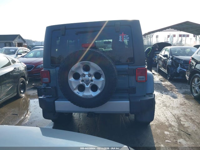 44338904 :رقم المزاد ، 1C4BJWEG0EL104797 vin ، 2014 Jeep Wrangler Unlimited Sahara مزاد بيع